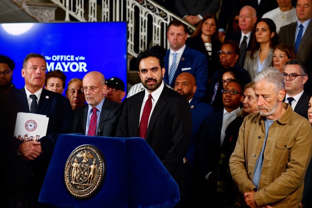New York City Mayor Zohran Mamdani, flanked by comedian and activist Jon Stewart, right, speaks at a news conference about the release of records related to air quality at Ground Zero after the 9/11 terror attacks (Reuters)