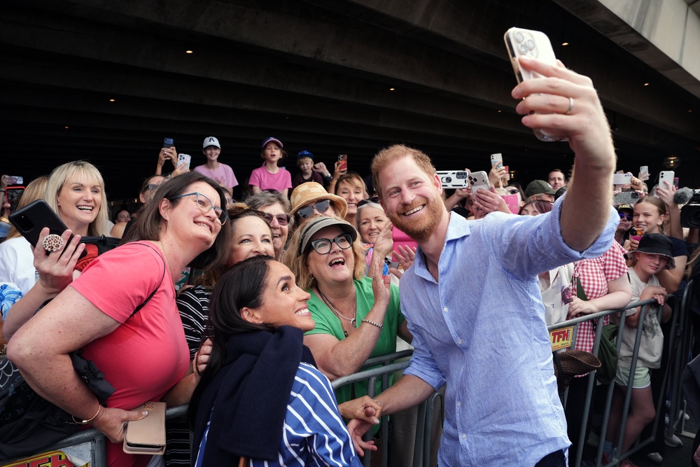 The Duke and Duchess of Sussex pose for a selfie at the Sydney Opera House, in April (Jonathan Brady/PA) (PA Wire)