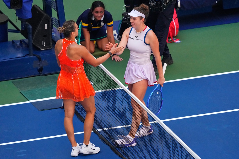 Aryna Sabalenka, left, and Linda Noskova embrace after a thrilling match (Yuki Iwamura/AP) (AP)