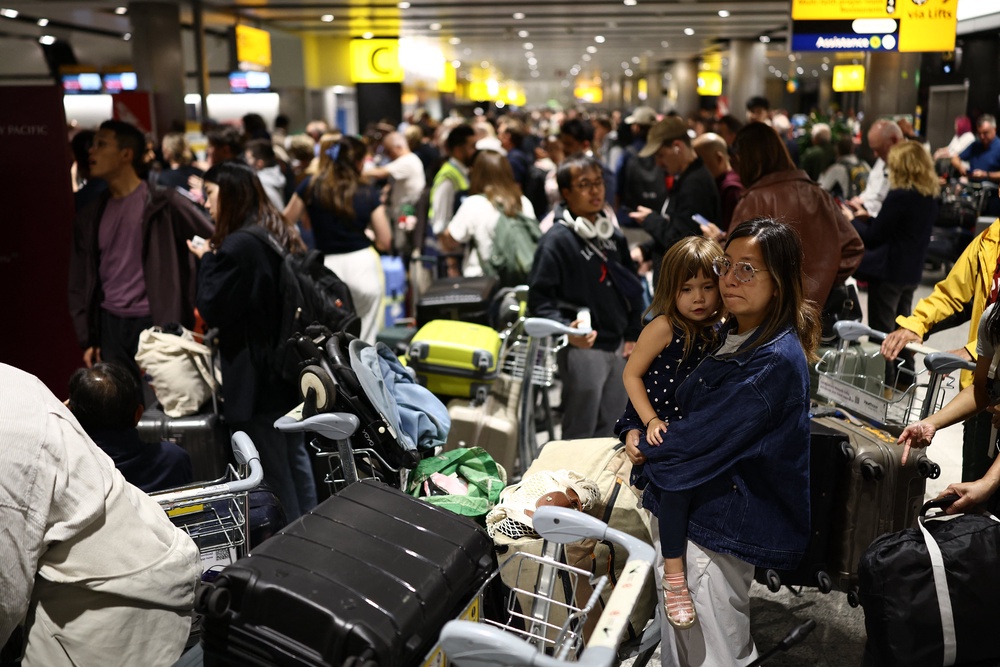 Delayed passengers at Terminal 3 of London Heathrow (AFP/Getty)
