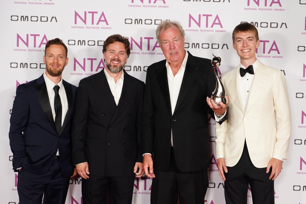 Jeremy Clarkson with award for Clarkson’s Farm the reality docuseries prize , with the new The Grand Tour presenters, Francis Bourgeois (right), James Engelsman (left) and Thomas Holland (ian West/PA) (PA Wire)