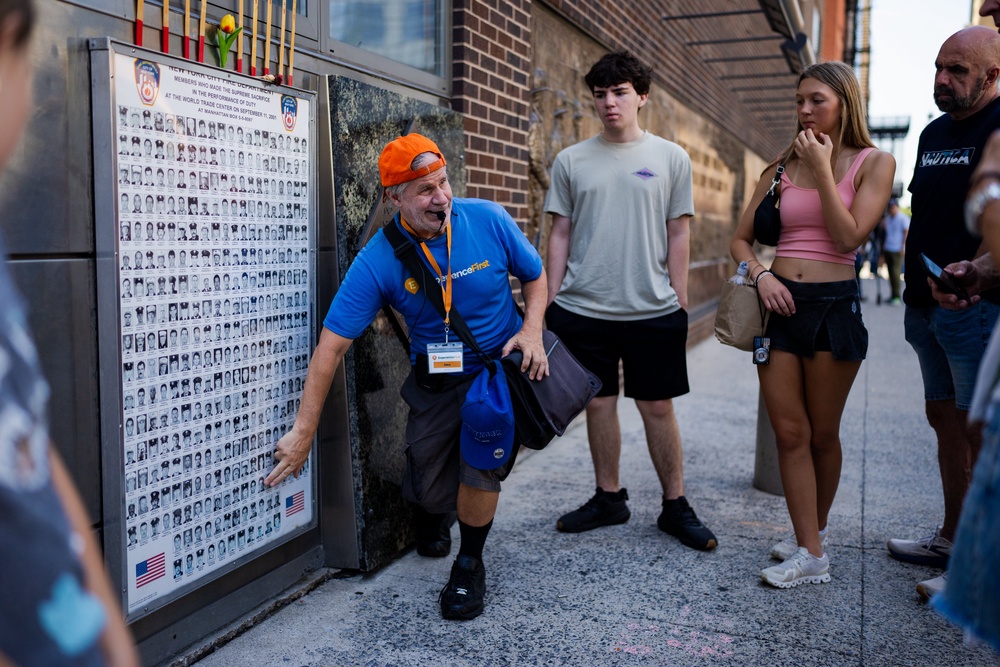 A tour guide talks about Daniel Suhr, the first firefighter to die in the 9/11 attacks (Copyright 2025 The Associated Press. All rights reserved.)