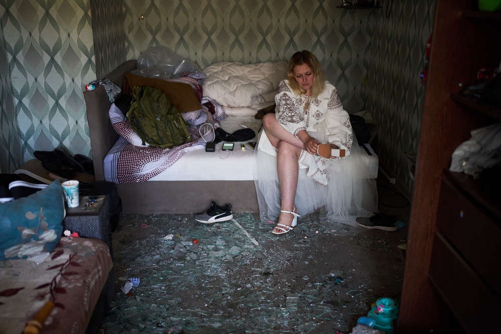 Liudmyla had already lived through one attack when a strike cut the gas lines and shattered windows in her home (Associated Press)
