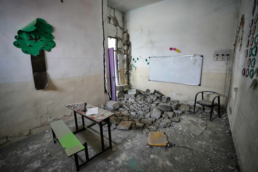 Photos show what remains of an Iranian school where some 120 children died in a U.S. strike (AP)