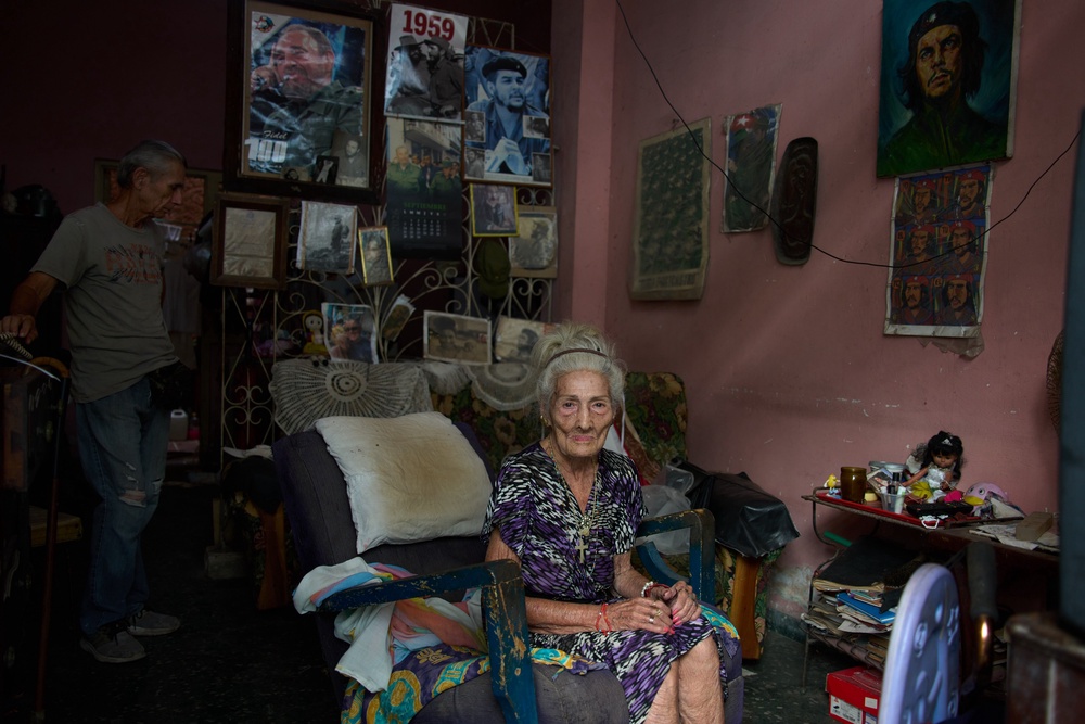 Many Cubans, like 70-year-old José Manuel Borroto Díaz and his 93-year-old mother Teresita del Rosario González Ricardo, say the only thing that keeps them going is family (AP Photo/Ramon Espinosa)