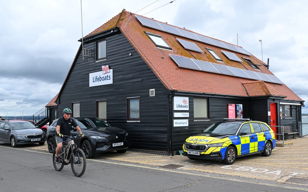 Police outside the Portsmouth Lifeboats Station at Eastney, Hampshire (Ollie Thompson/Solent News)