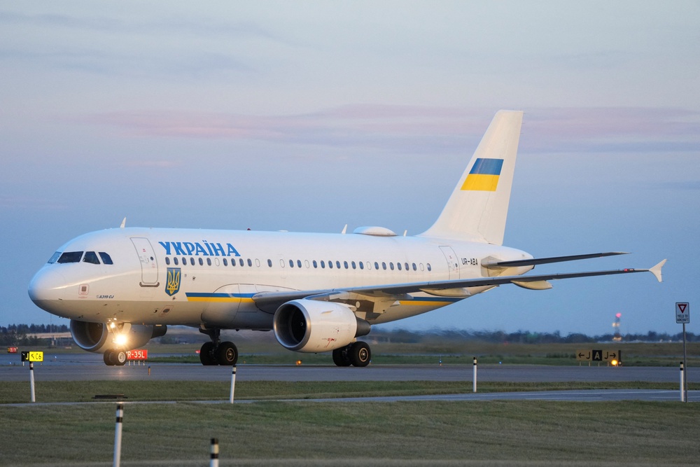 An aircraft carrying Ukraine's President Volodymyr Zelenskiy and his wife, Olena Zelenska, arrives a day before Zelenskiy's meeting with Canadian leaders, at Calgary International Airport in Calgary, Alberta (Reuters)