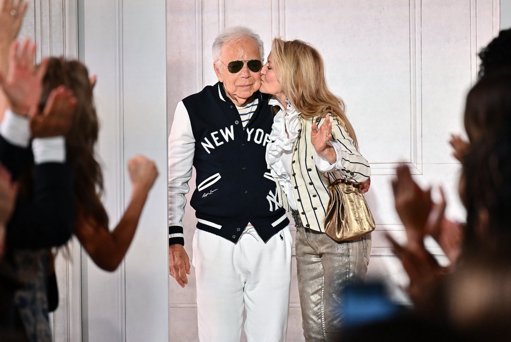 Ralph Lauren accepted applause at the end of the show with his wife, Ricky (Evan Agostini/AP) (AP)
