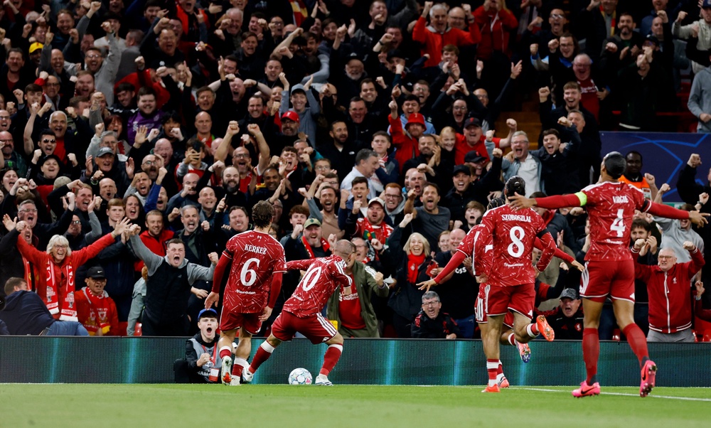 Liverpool's Alexis Mac Allister celebrates scoring against Atletico Madrid (Reuters)