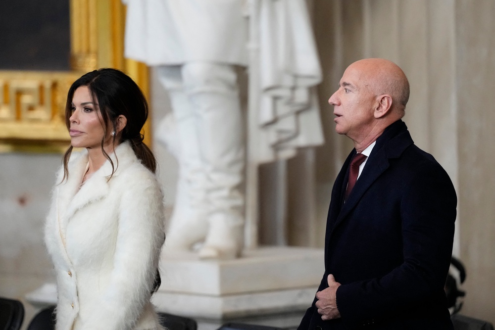 Bezos and then-fiancee Lauren Sánchez in the Capitol Rotunda while attending the inauguration of Donald Trump as the 47th president in Washington on January 20, 2025 (AFP/Getty)