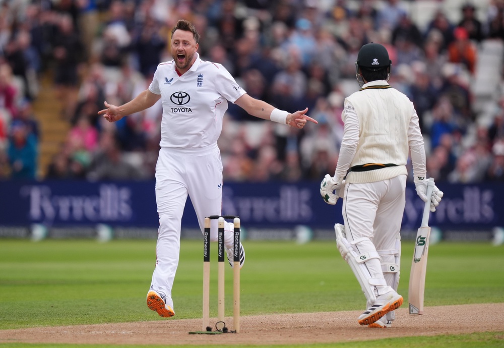 Ollie Robinson celebrates the wicket of Saim Ayub (Mike Egerton/PA) (PA Wire)