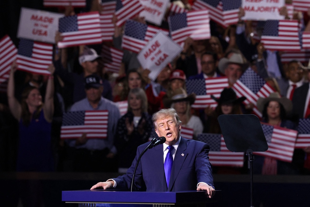 Despite endorsing Paxton, Trump took time out of his speech in Dallas Wednesday night to poke fun at the way the Republican dresses as he campaigns for votes in a competitive U.S. Senate race against Democrat James Talarico (AFP via Getty Images)