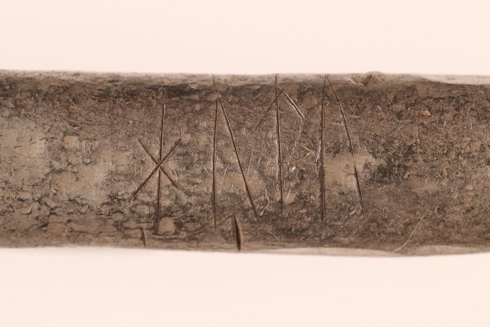 Runes engraved on silver bars (Museum of Northern Jutland)