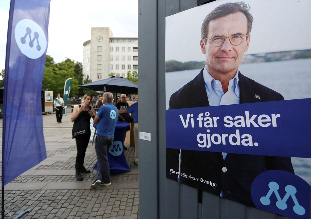 A poster of Swedish Prime Minister and leader of the Moderates Ulf Kristersson on his party’s campaign stand for the upcoming election in Malmo, Sweden, August 26, 2026 (Reuters)