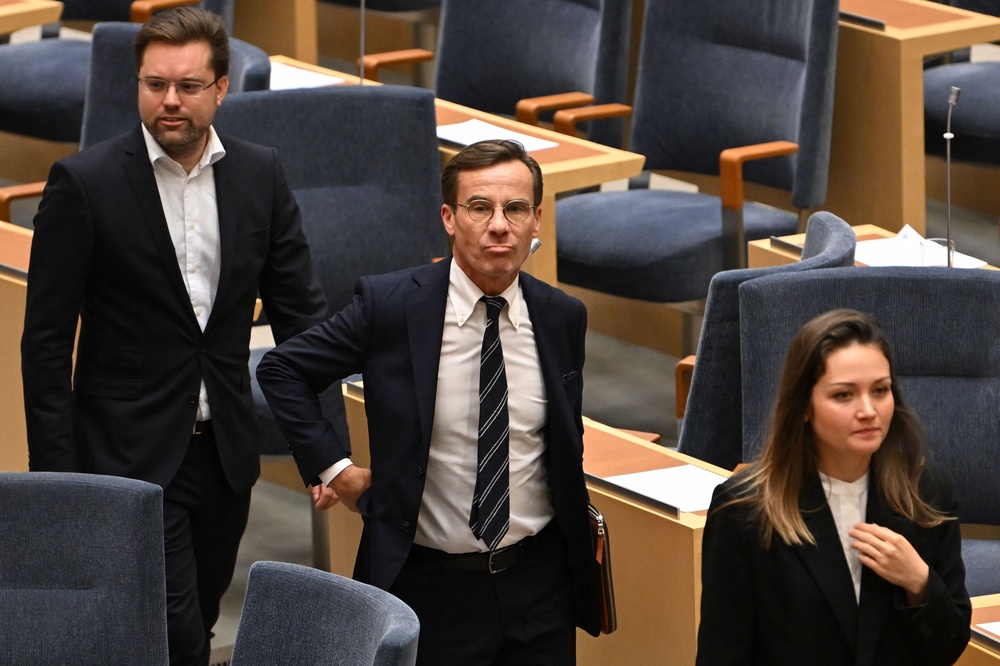 Prime minister Ulf Kristersson (centre) pictured in 2022 (AFP/Getty)