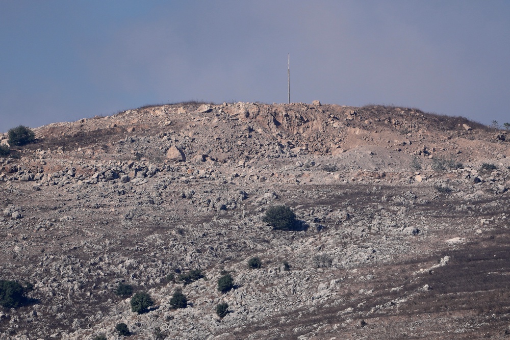 The aftermath of the explosion on Ali al-Taher ridge. (AP)