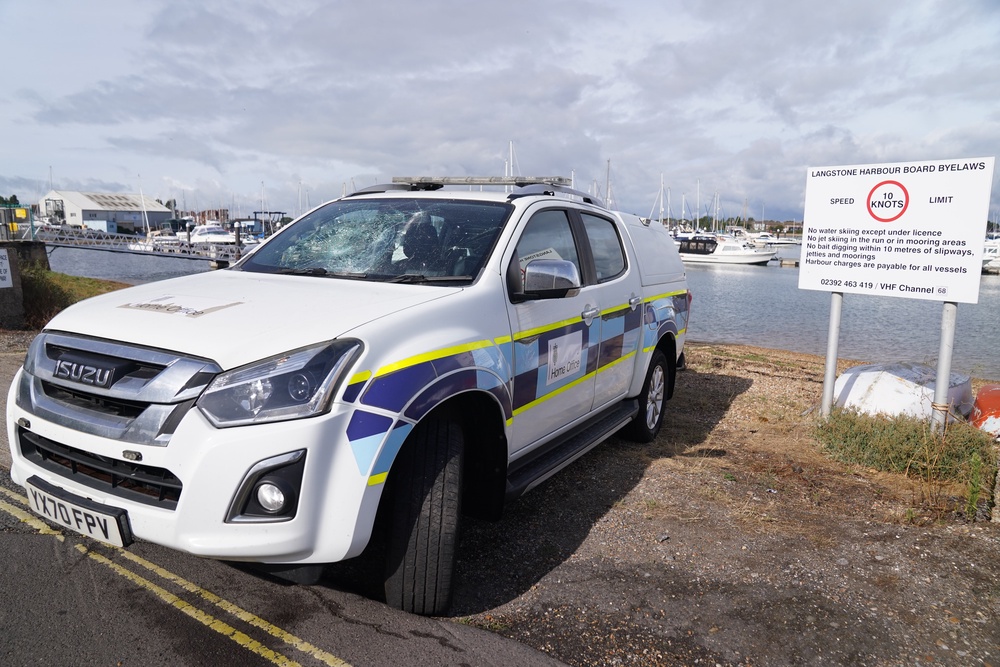 A damaged Home Office vehicle with a smashed windscreen at Eastney Point (PA) (PA Wire)