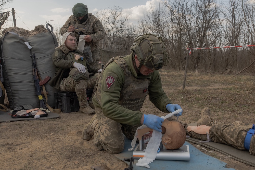 Ukrainian recruits of Air Assault Forces practice combat first aid during a basic military training, in a training center, at an undisclosed location on 27 March  2026 (AFP/Getty)