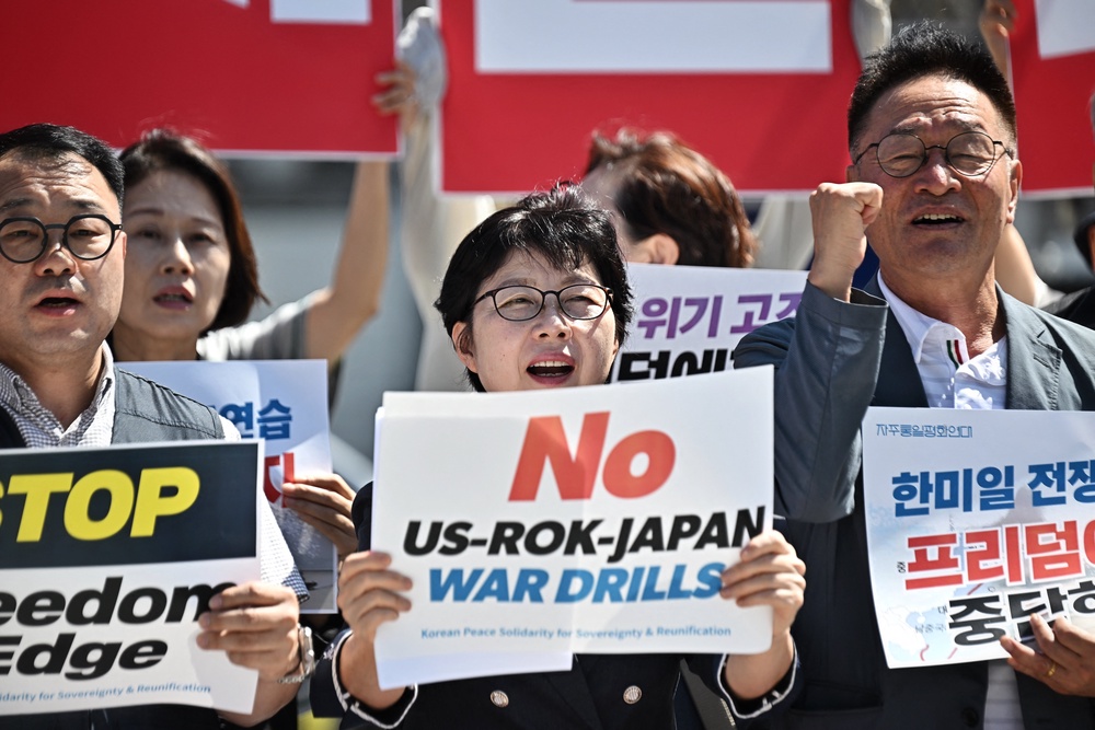 Supporters of the Korean Peace Solidarity for Sovereignty and Reunification protest against the South Korea, US and Japan trilateral military exercise Freedom Edge in front of the American embassy in Seoul on 7 September 2026 (AFP/Getty)