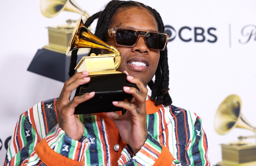 Lil Durk poses with his Grammy for the Best Melodic Rap Performance award during the 66th Annual Grammy Awards in Los Angeles (Reuters)
