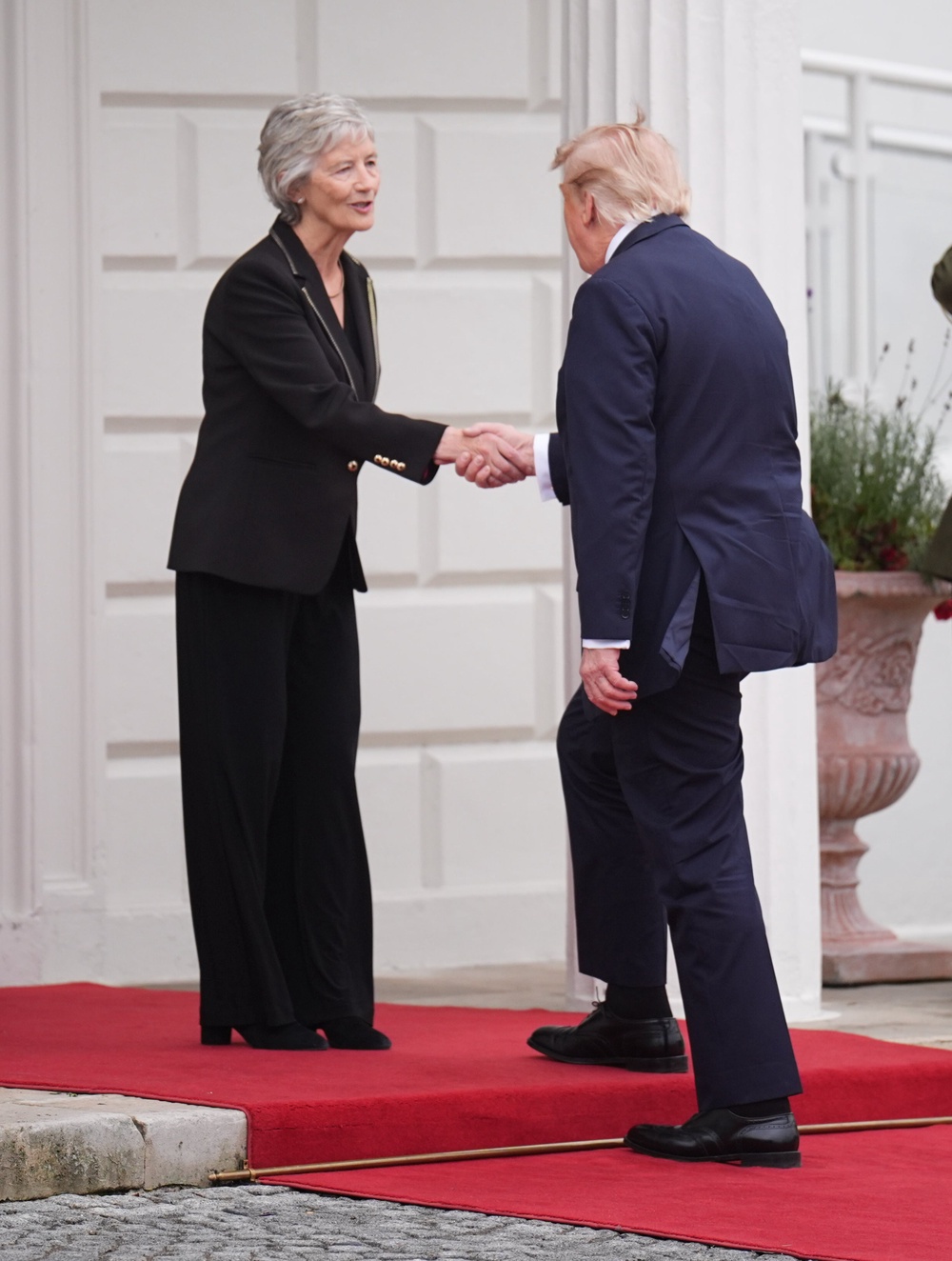 President Catherine Connolly welcomes US President Donald Trump as he arrives for a meeting at Áras an Uachtaráin (James Manning/PA) (PA Wire)