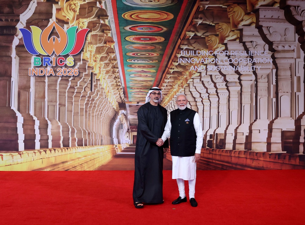 Narendra Modi shakes hands with UAE’s Sheikh Khaled bin Mohamed bin Zayed Al Nahyan (Reuters)
