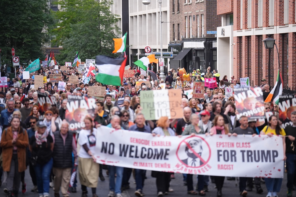 People take part in an anti-Trump protest march through Dublin city centre (James Manning/PA) (PA Wire)