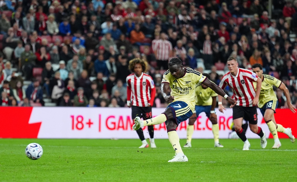 Bukayo Saka sealed the points from the penalty spot in added time (Owen Humphreys/PA) (PA)