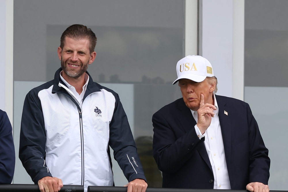 US president Donald Trump with his son Eric Trump (PA Wire)