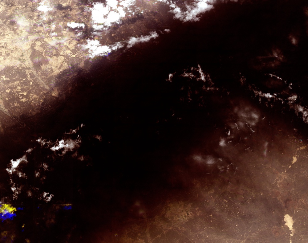 A satellite image shows black smoke rising from an area of Saudi Arabia’s East-West oil pipeline south of Medina (Reuters)