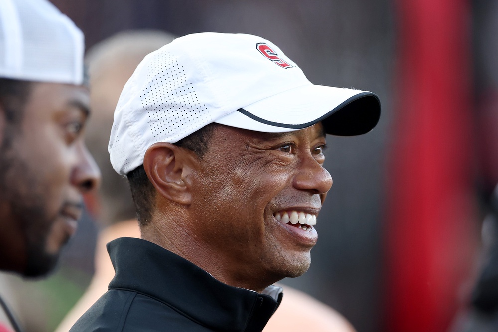 Professional golfer and Stanford Cardinal alumni Tiger Woods stands on the sidelines during the first half of the Stanford Cardinal game against the Miami (FL) Hurricanes at Stanford Stadium on September 04, 2026 in Stanford, California (Getty)