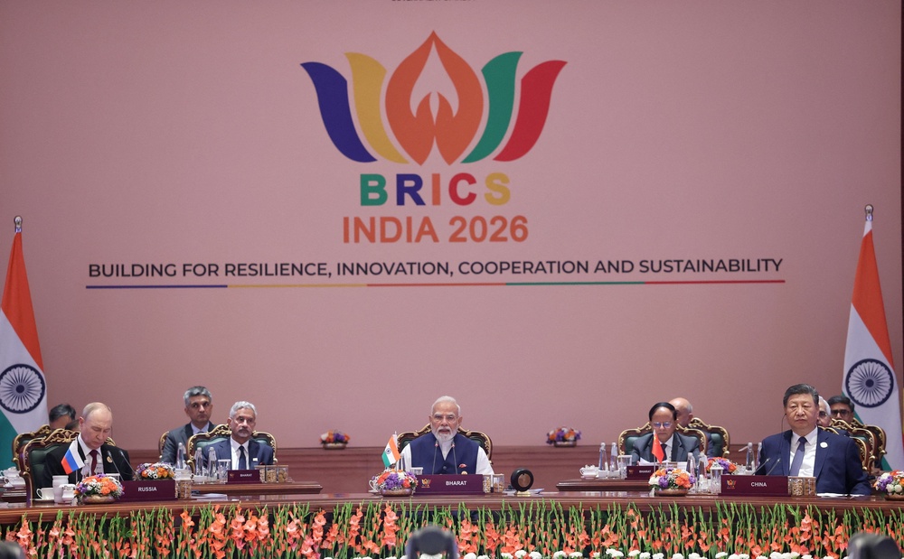 India’s Narendra Modi addresses the Brics Summit as Russia’s Vladimir Putin and China’s Xi Jinping listen (Reuters)