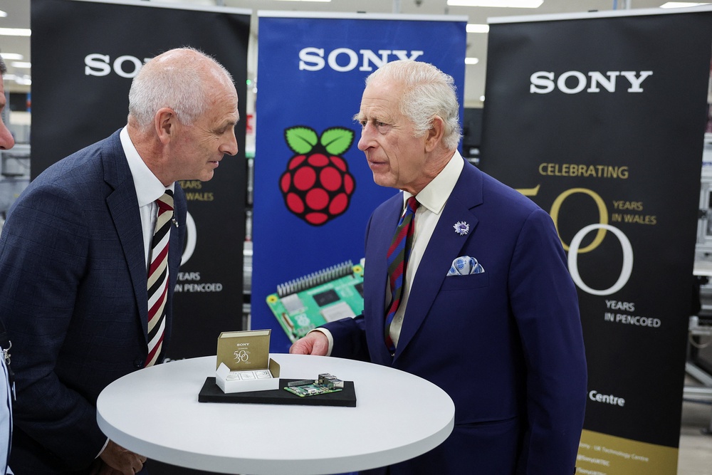King Charles III speaks with Raspberry Pi Chief Commercial Officer Mike Buffham, during a visit to the Sony UK Technology Centre, marking 50 years of Sony in Wales, on July 11, 2024 in Bridgend, Wales (Getty)