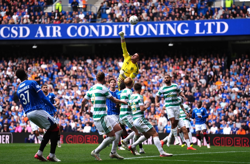 Sam Johnstone retained his place in goal for Celtic but struggled on his Old Firm derby (PA)