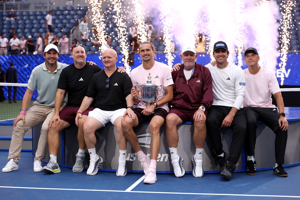 Alexander Zverev poses with the trophy and his coaches after defeating Ben Shelton (Getty)