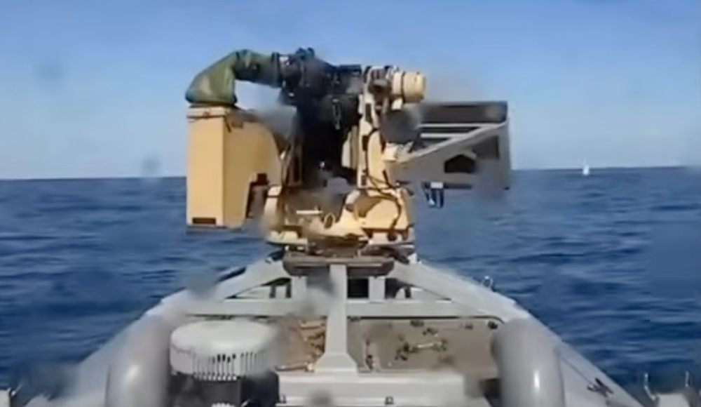 The Ukrainian drone engaged the Russian boat (right) with its gun, destroying it, according to the Ukrainian navy (Ukrainian Navy)