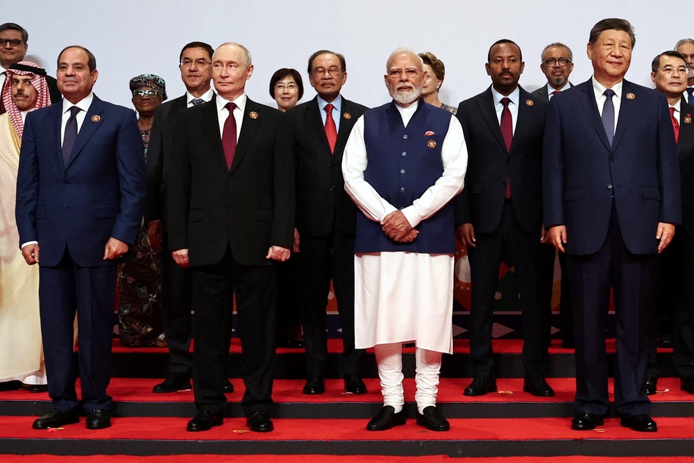 Egyptian President Abdel FattEgyptian President Abdel Fattah al-Sisi, Russian President Vladimir Putin, Indian Prime Minister Narendra Modi and Chinese President Xi Jinping pose for a family photo on day two of the BRICS Summit in New Delhi, Indiaah al-Sisi, Russian President Vladimir Putin, Indian Prime Minister Narendra Modi and Chinese President Xi Jinping pose for a family photo on day two of the BRICS Summit in New Delhi, India (Reuters)