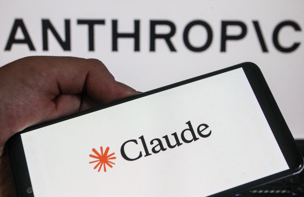 A smartphone displaying the logos of US artificial intelligence company Anthropic and its Claude AI assistant (AFP/Getty)