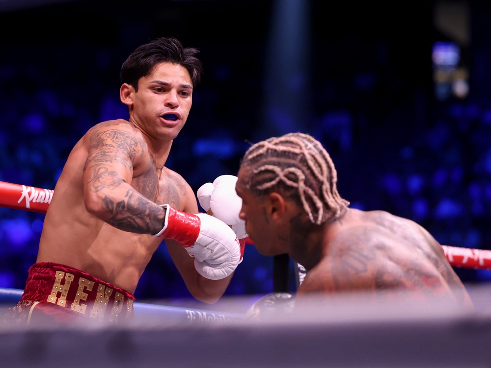 Garcia floored Benn with a massive right hook in round two (AP)