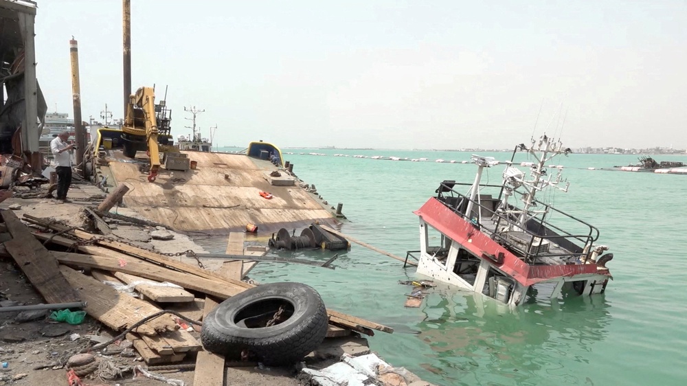 Damage in the aftermath of Houthi strikes on the Red Sea port city of Mocha, on 10 August (Reuters)