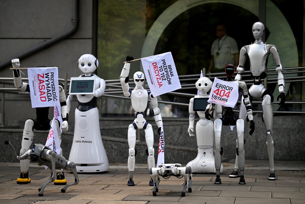 Robots attend a demonstration calling for the regulation of artificial intelligence development in Warsaw on 7 September, 2026. (AFP/Getty)