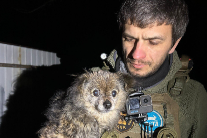 Ruslan Horbal, 43, with a rescued animal in Ukraine's Kharkiv region (PETA Germany)