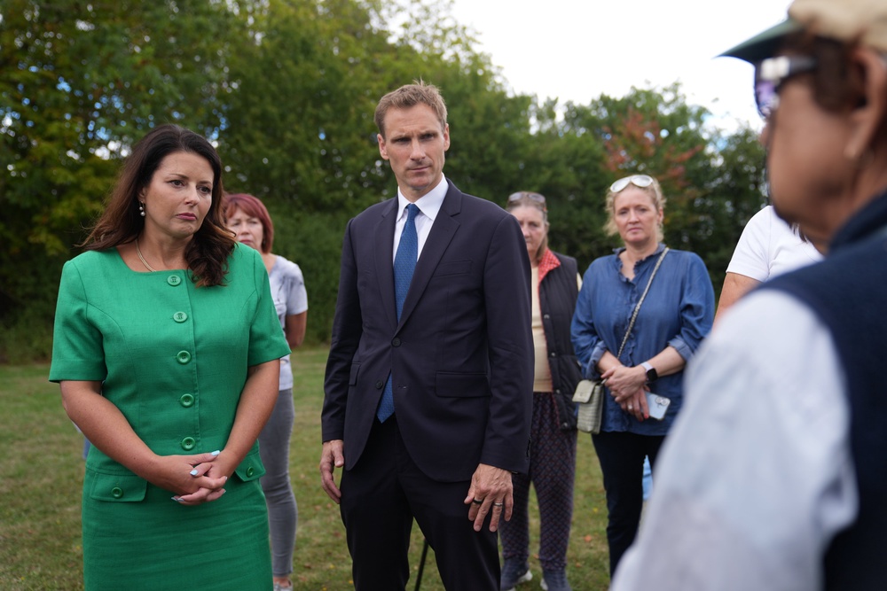 Shadow home secretary Chris Philp and shadow minister for women and equalities Joy Morrissey (left) speak with Piddington residents (Joe Giddens/PA) (PA Wire)