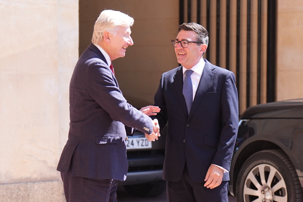 Sir Clive Alderton (left), with Prime Minister Andy Burnham (Aaron Chown/PA) (PA Wire)