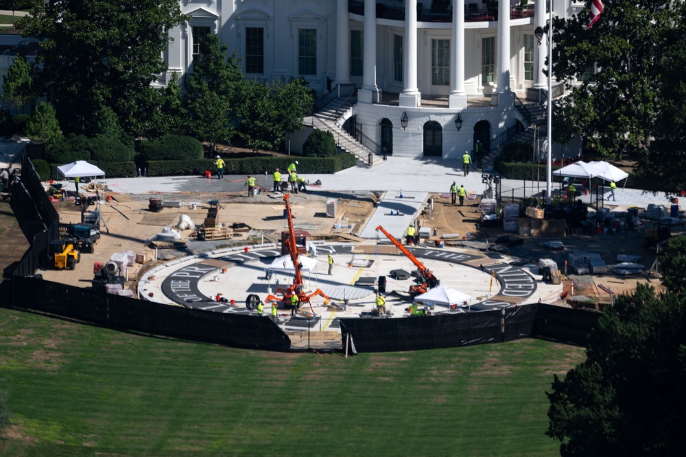 Trump shared a photo of the newly constructed black and white granite ‘heliport landing zone’ on the South Lawn of the White House Monday, calling it a 'work of art' (AFP via Getty Images)