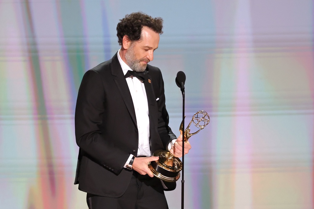 Matthew Rhys accepted the Emmy for Outstanding Lead Actor in a Limited or Anthology Series or Movie for his role in 'The Beast In Me' (Getty)