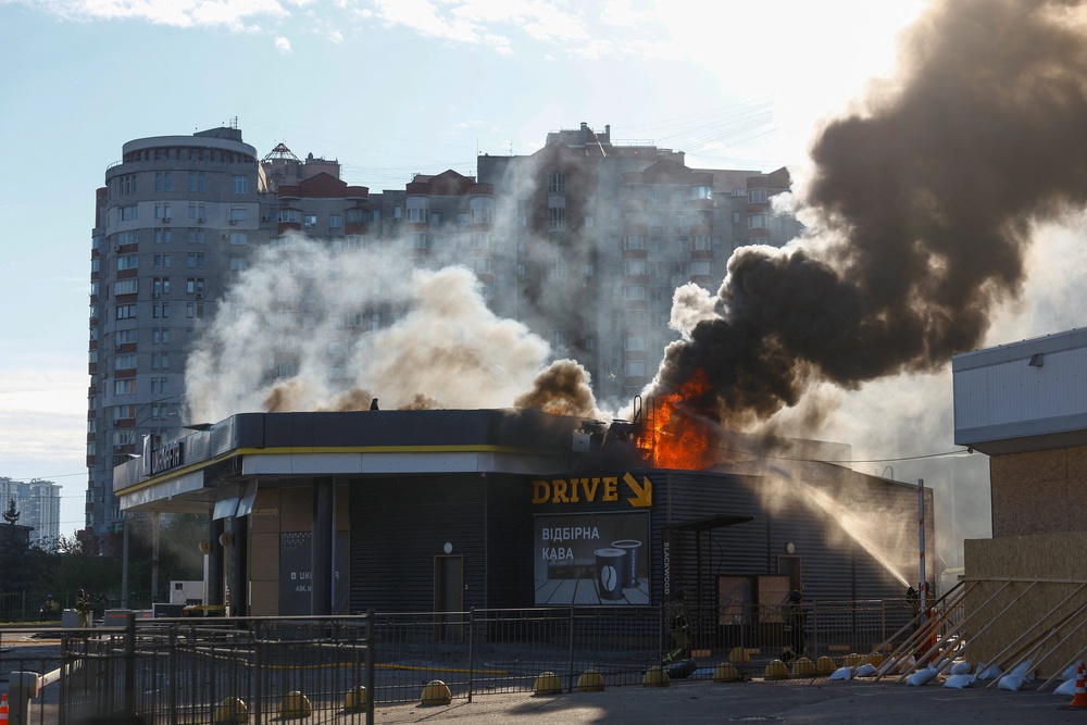 Firefighters work at the site of a gas station hit by a Russian drone strike, amid Russia's attack on Ukraine, in Kyiv, Ukraine September 15, 2026. (Reuters)