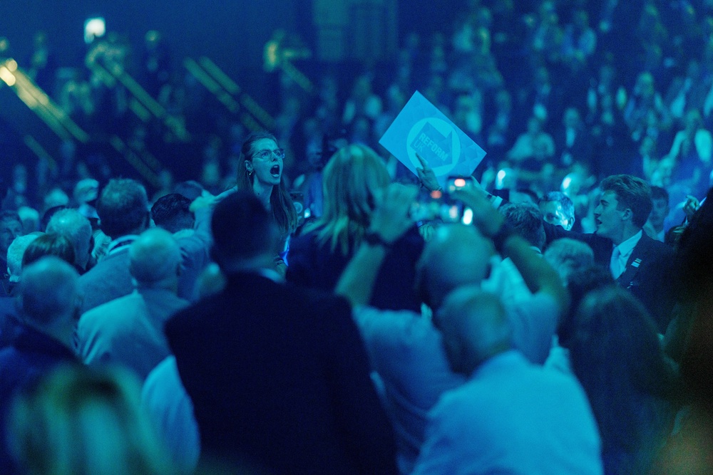 Some female protesters were assaulted by audience members at the Reform UK party conference (Getty)