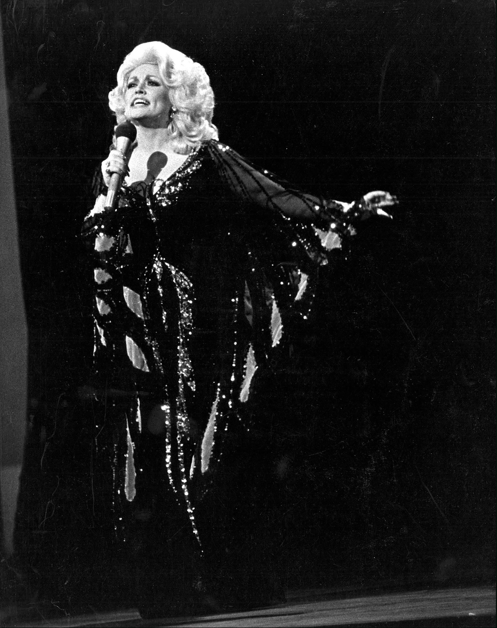 Dolly Parton in the ‘butterfly dress’ (Alamy/PA)