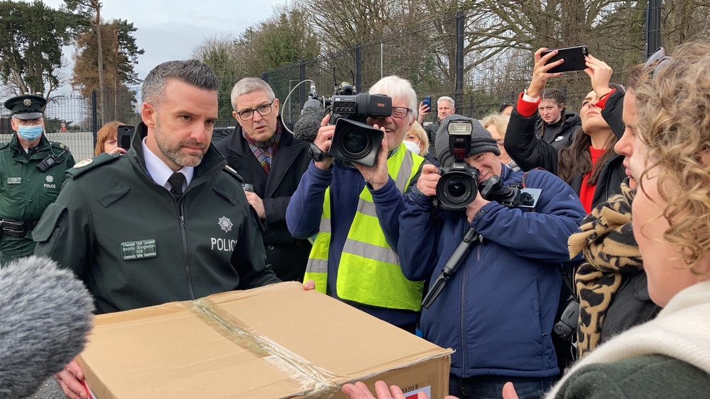 PSNI assistant chief constable Bobby Singleton receives a petition from Fiona Donohoe the mother of Noah Donohoe on February 25 2022 (Rebecca Black/PA) (PA Archive)